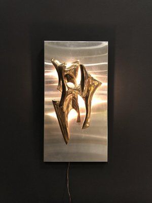 Sculptural bronze wall lamp by Fred Brouard, 1976