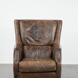 Very comfortable vintage cow leather armchair with beautiful colours