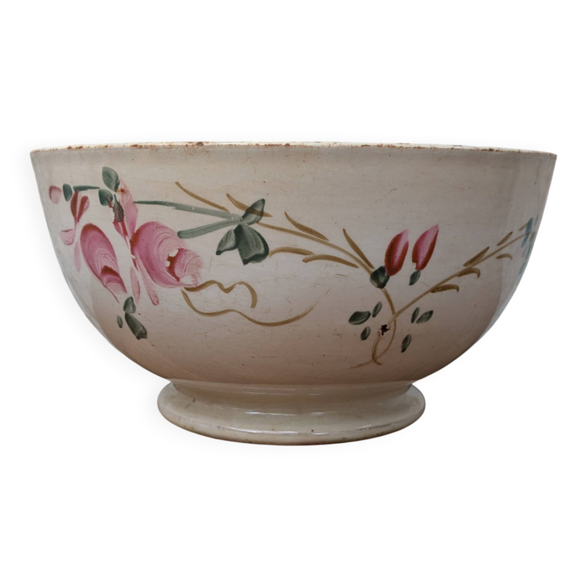 Old opaque porcelain bowl from Gien with a floral decoration.