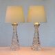 Crystal glass table lamps by Carl Fagerlund for Orrefors, Sweden.