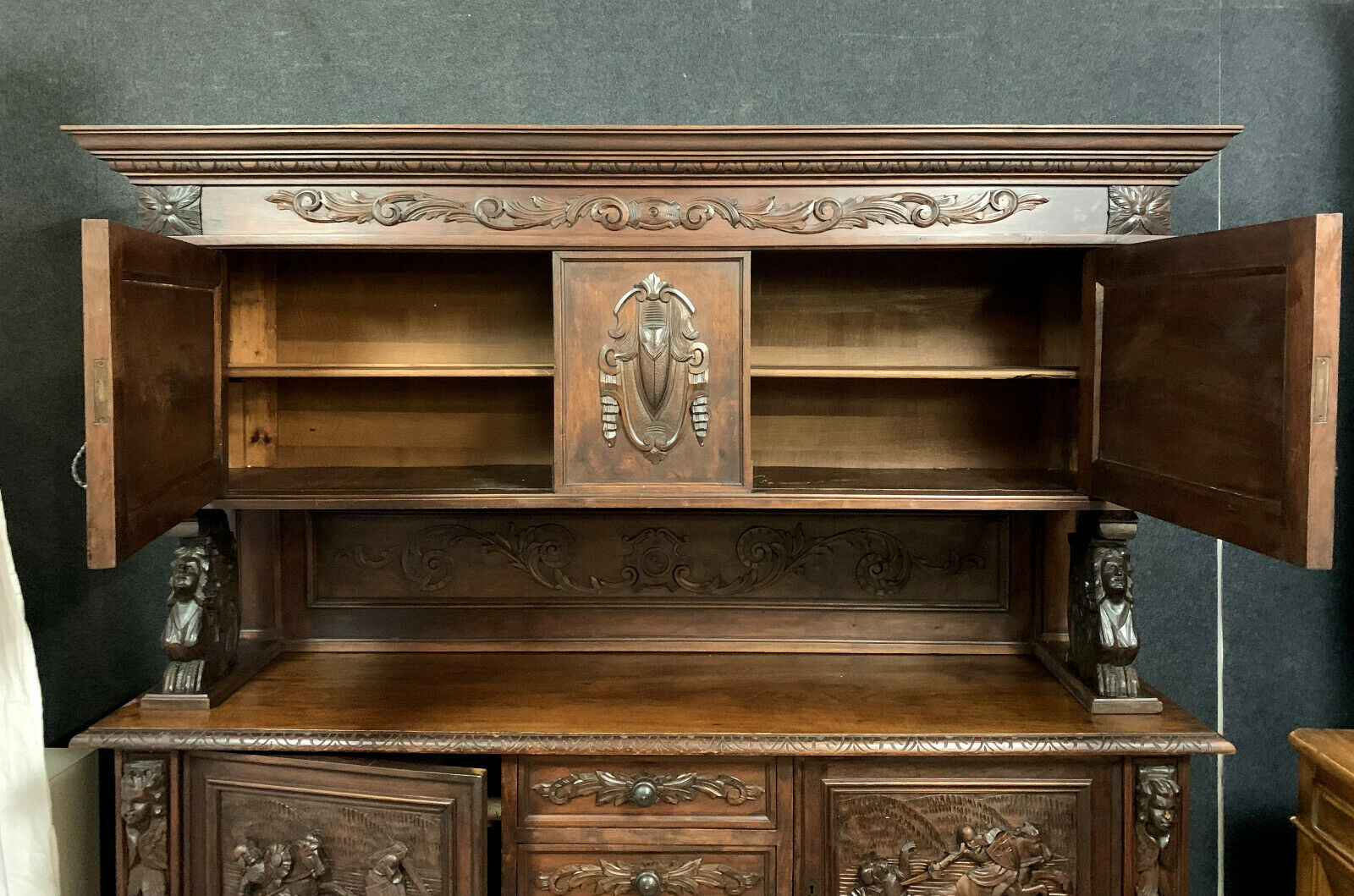 Wooden Renaissance hunting pavilion buffet made entirely carved with war attributes