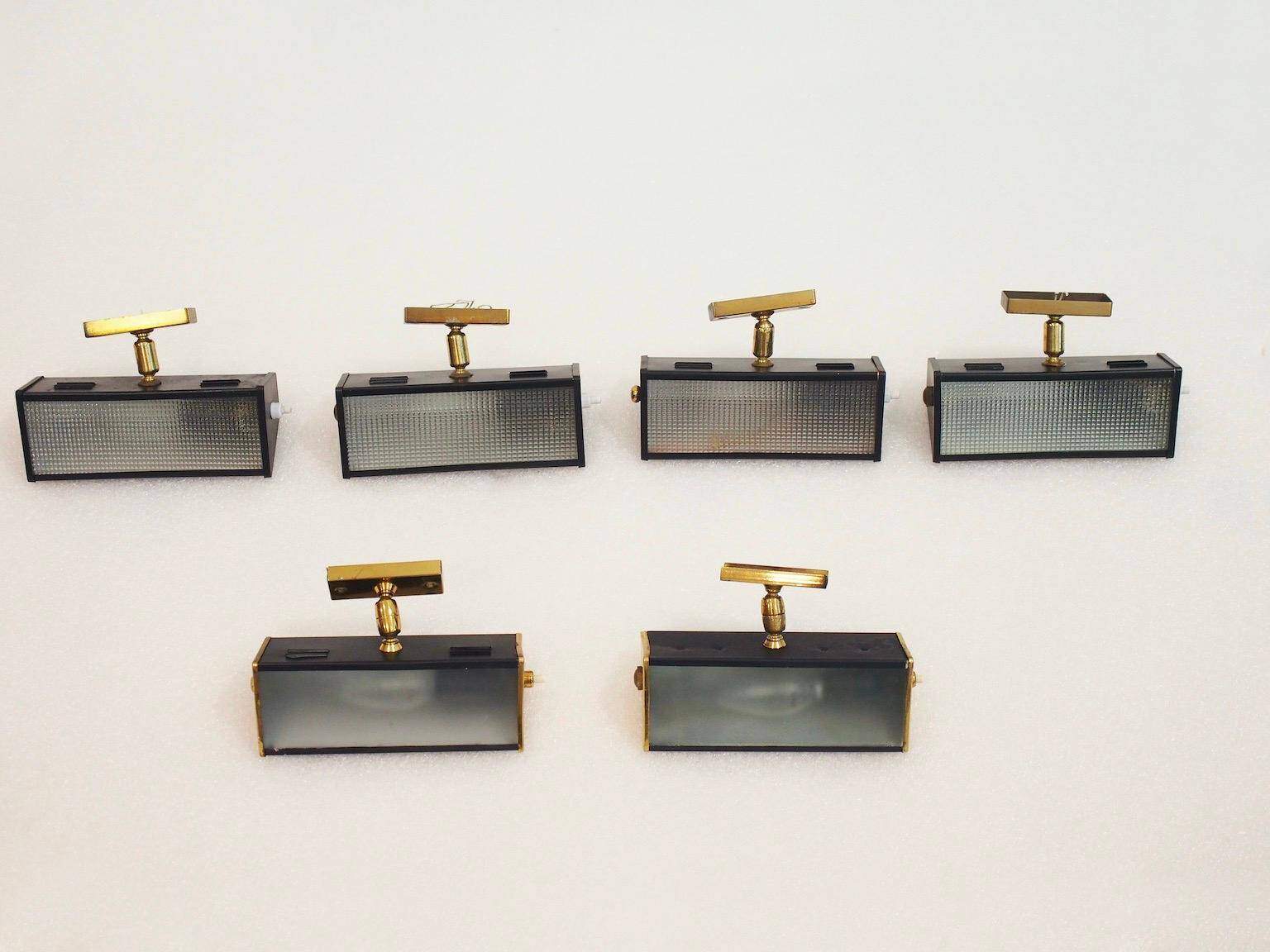 Six Italian wall sconces in brass and metal from the mid-20th century.