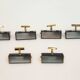 Six Italian wall sconces in brass and metal from the mid-20th century.