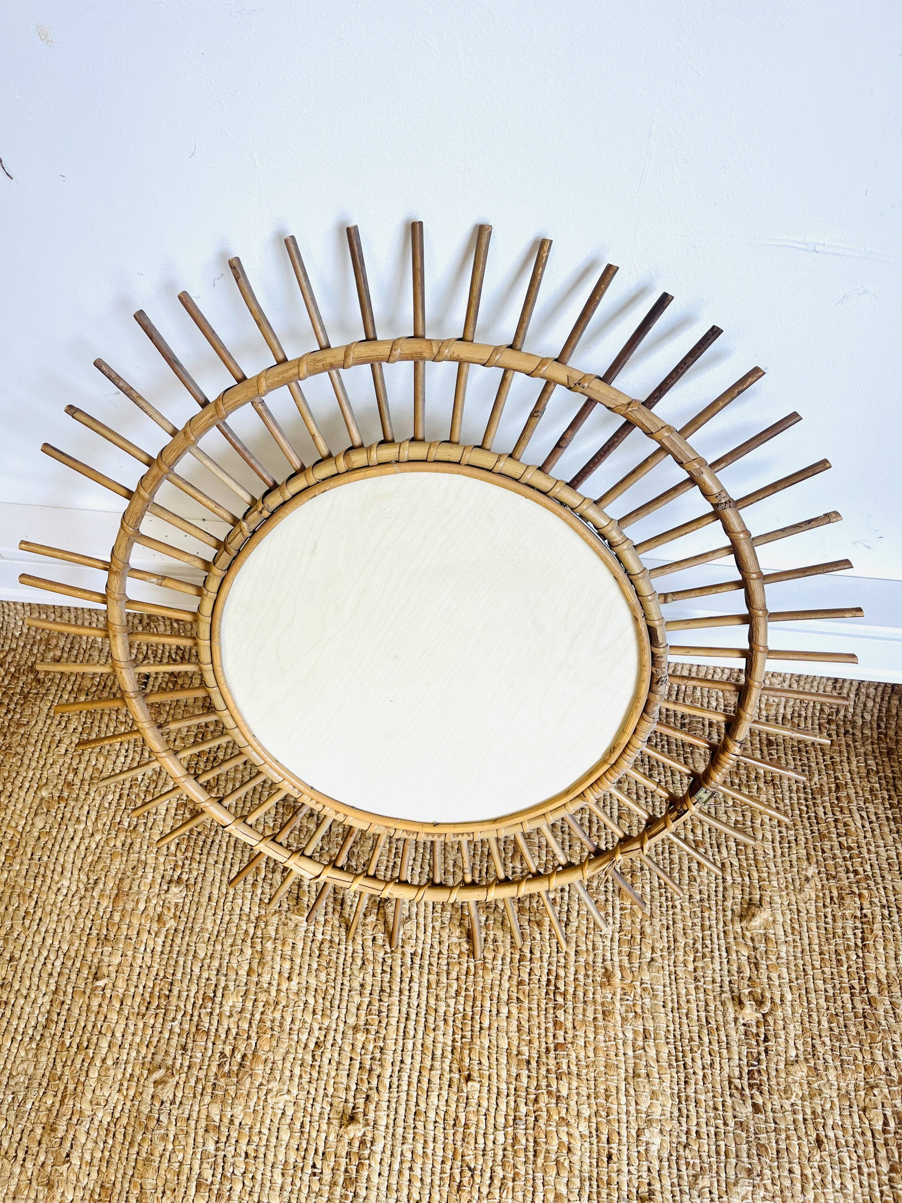 Vintage woven rattan sun mirror from the 60s