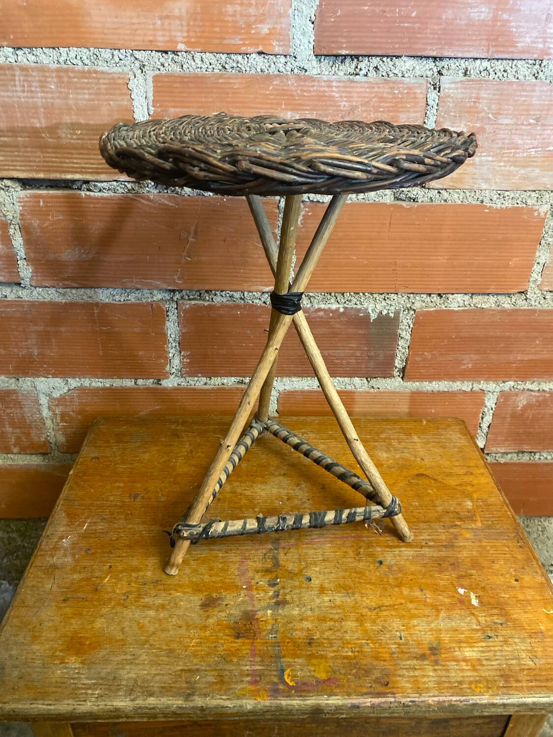 Vintage wooden tripod side table + woven wicker top