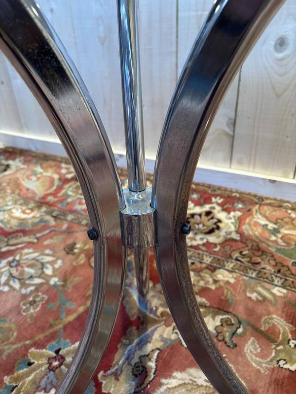 Contemporary glass and chrome dining table.