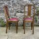 Pair of studded burgundy leather Art Deco chairs