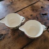 Pair of hand-painted floral-decorated jugs