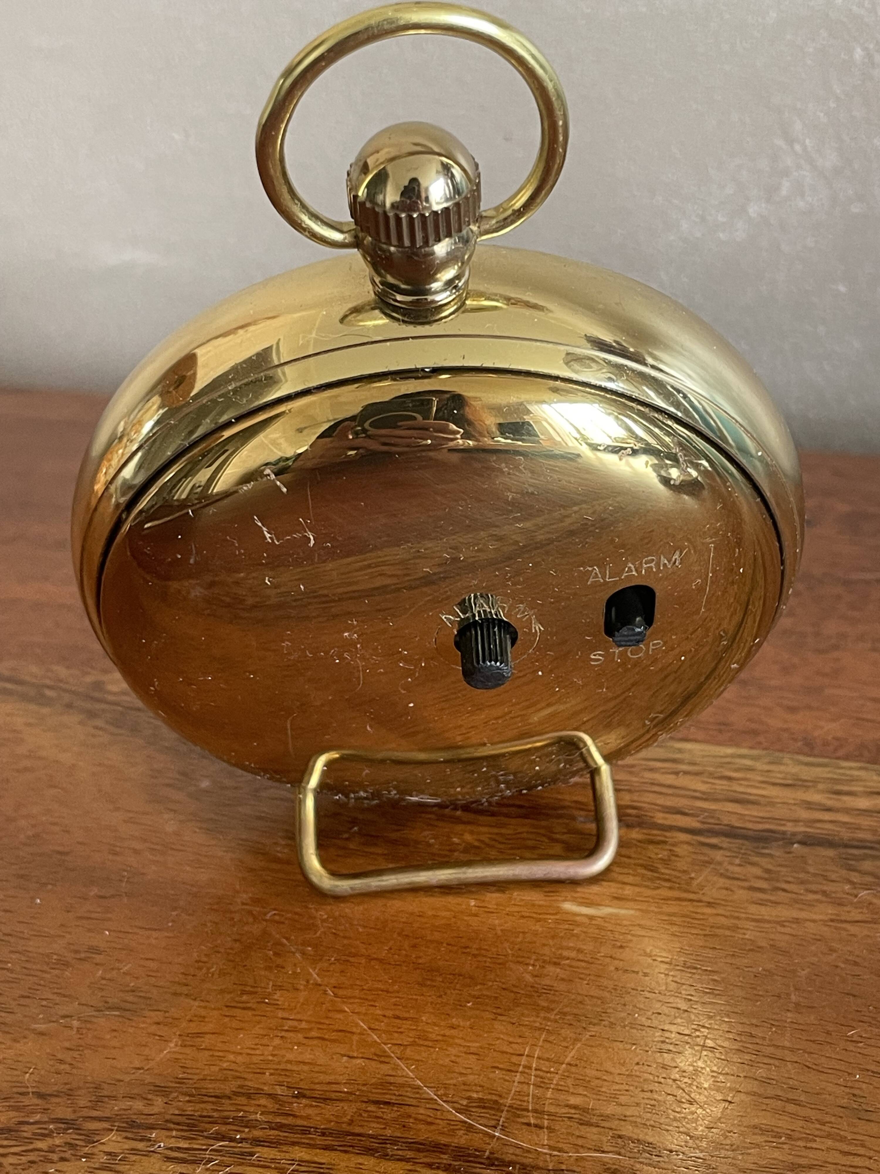 Lancel alarm clock pocket shape