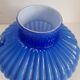 Blue opaline vase with a round handle