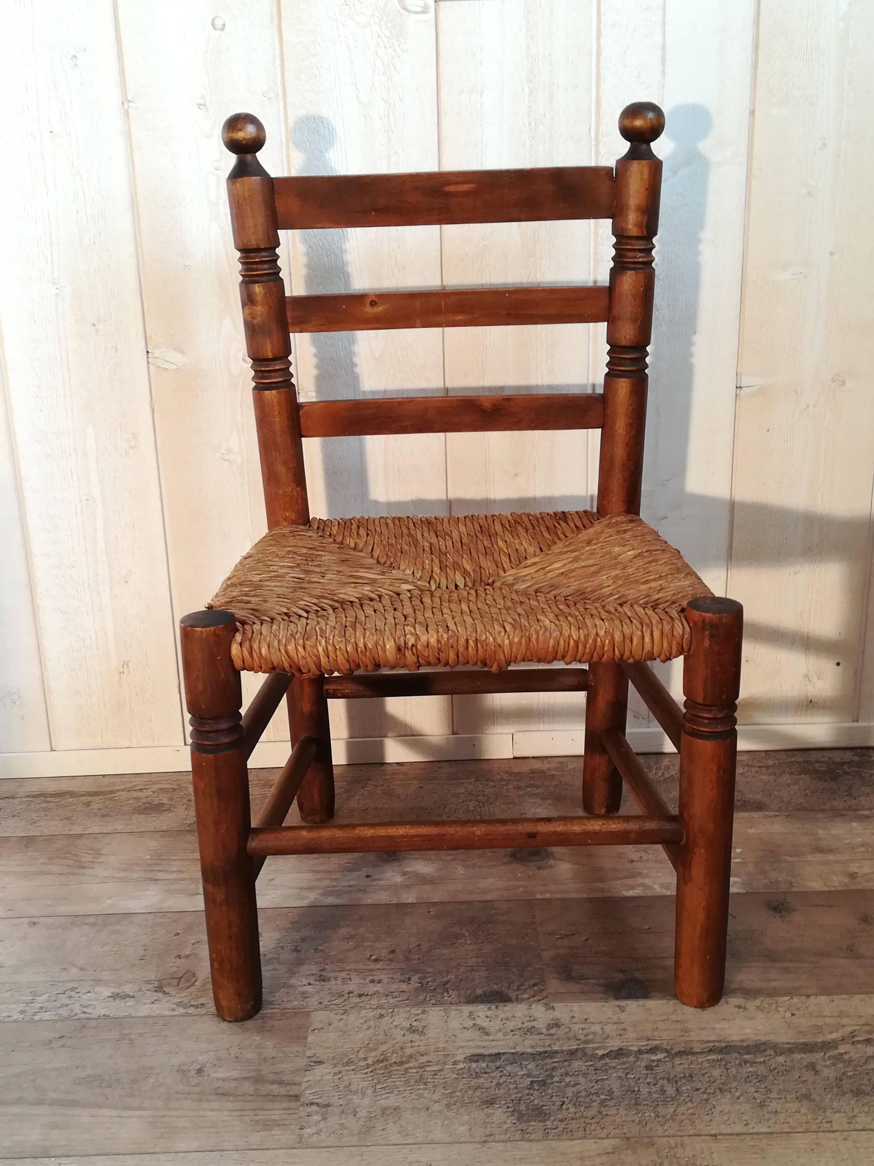 Wooden chair and straw