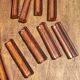 Ten pink glass knife holders