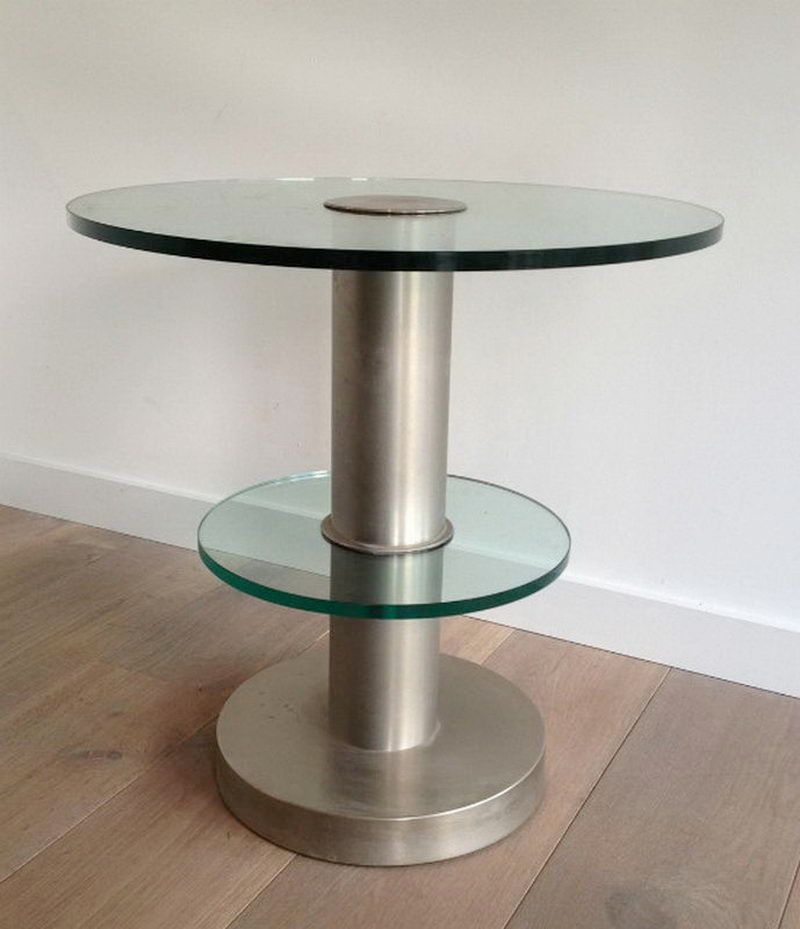 Brushed metal pedestal table and glass slabs