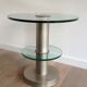 Brushed metal pedestal table and glass slabs