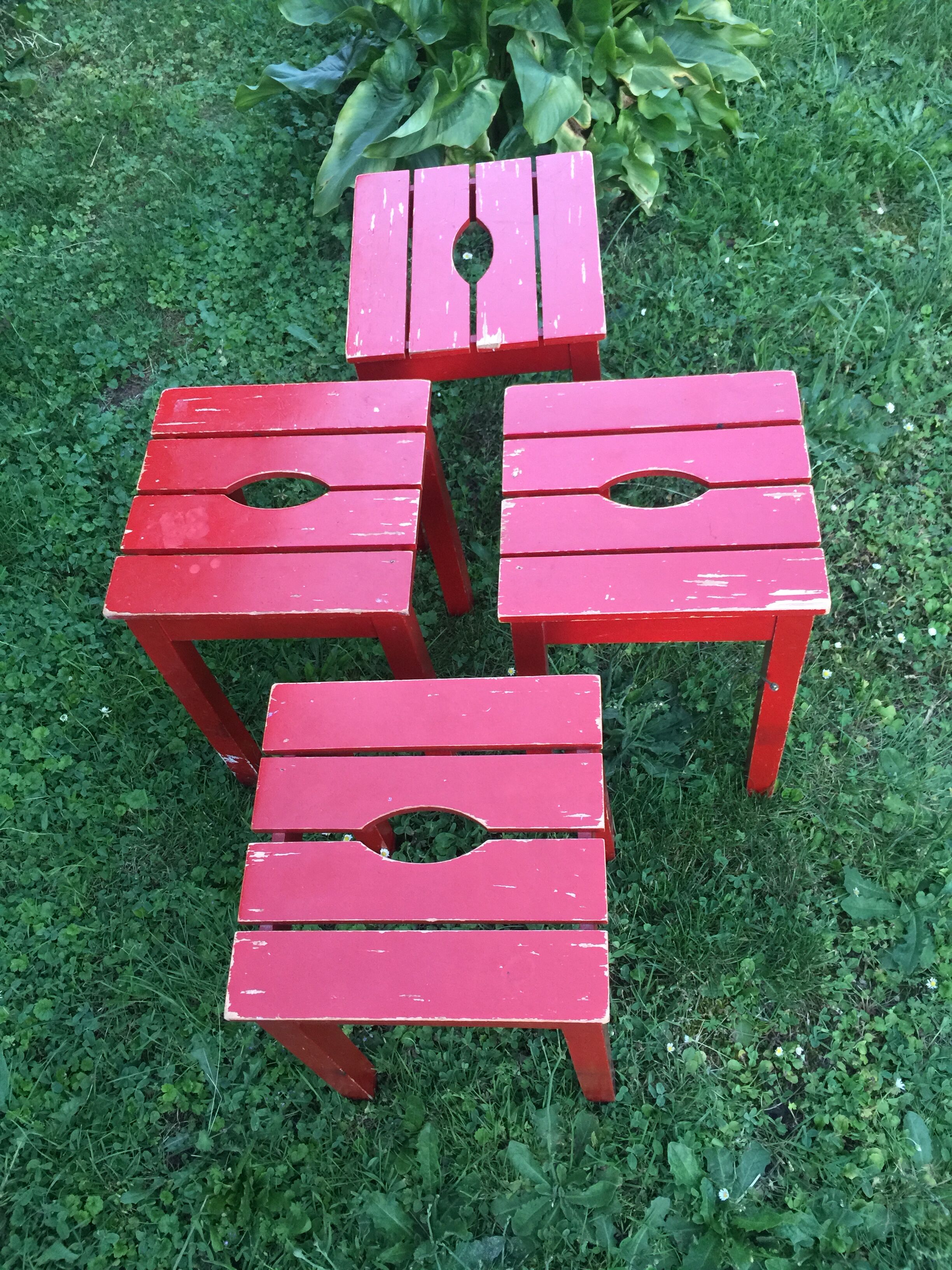 Suite of 4 vintage red stools