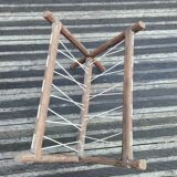 Vintage wooden and wire magazine rack