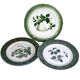 Antique earthenware plates with fruit decoration.