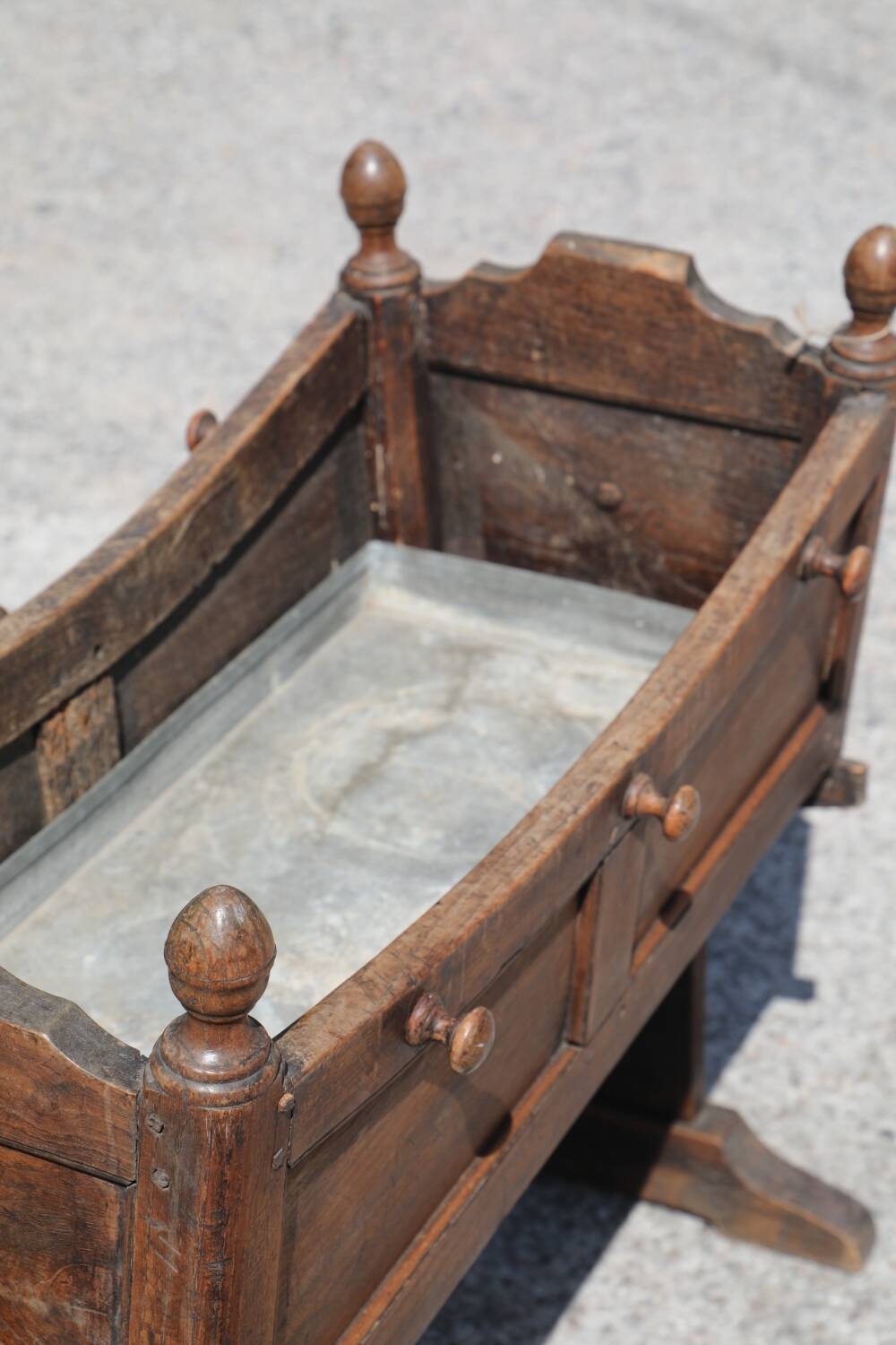 Antique cradle planter