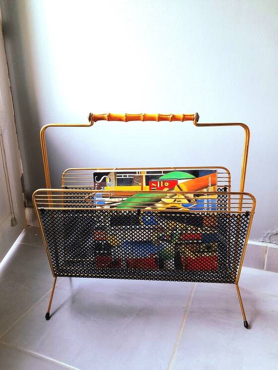 Perforated metal magazine rack, 1950