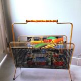 Perforated metal magazine rack, 1950