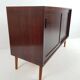 Danish vintage furniture with rosewood sliding doors Hundevad