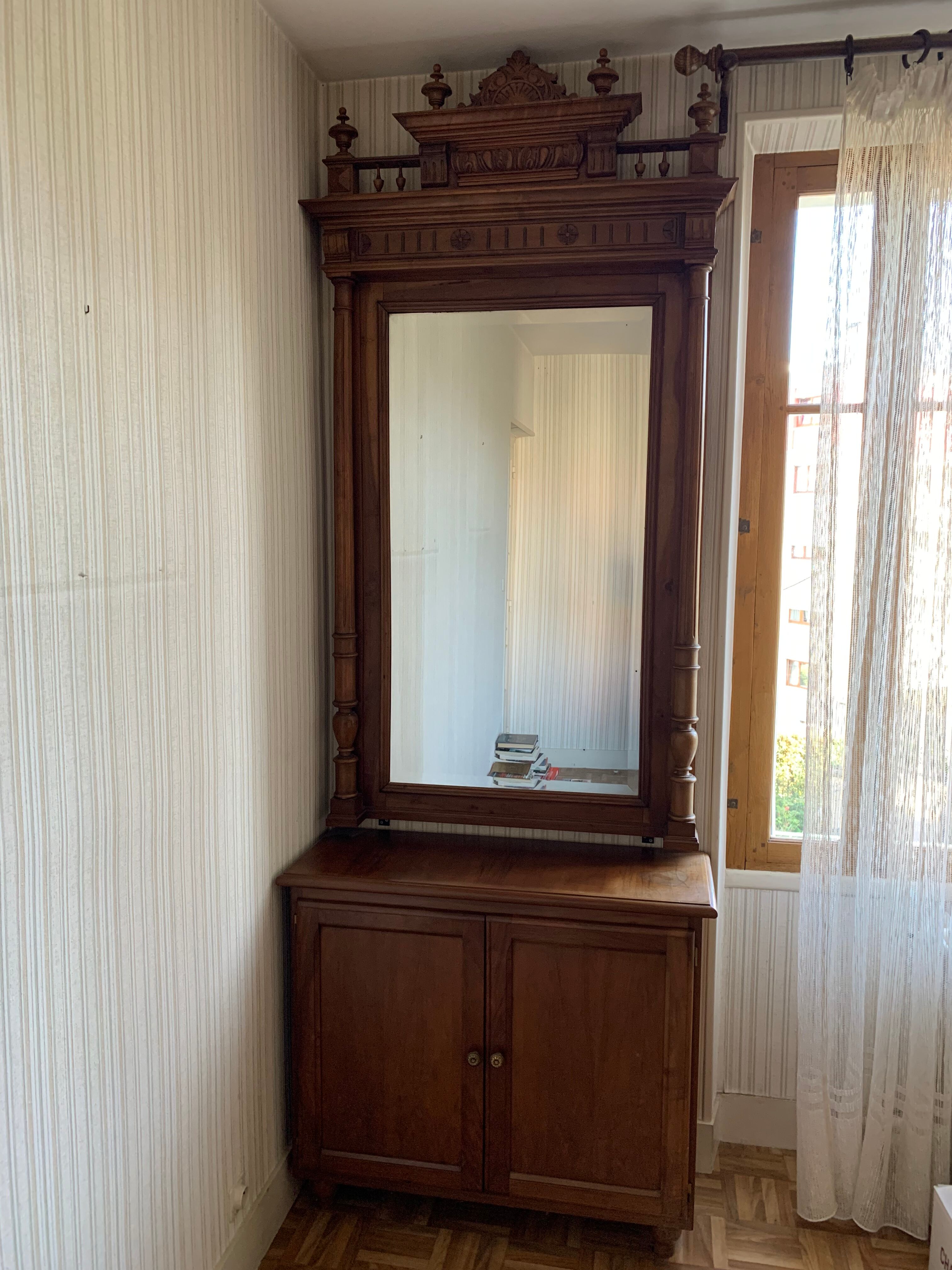 Mirror and low walnut cabinet