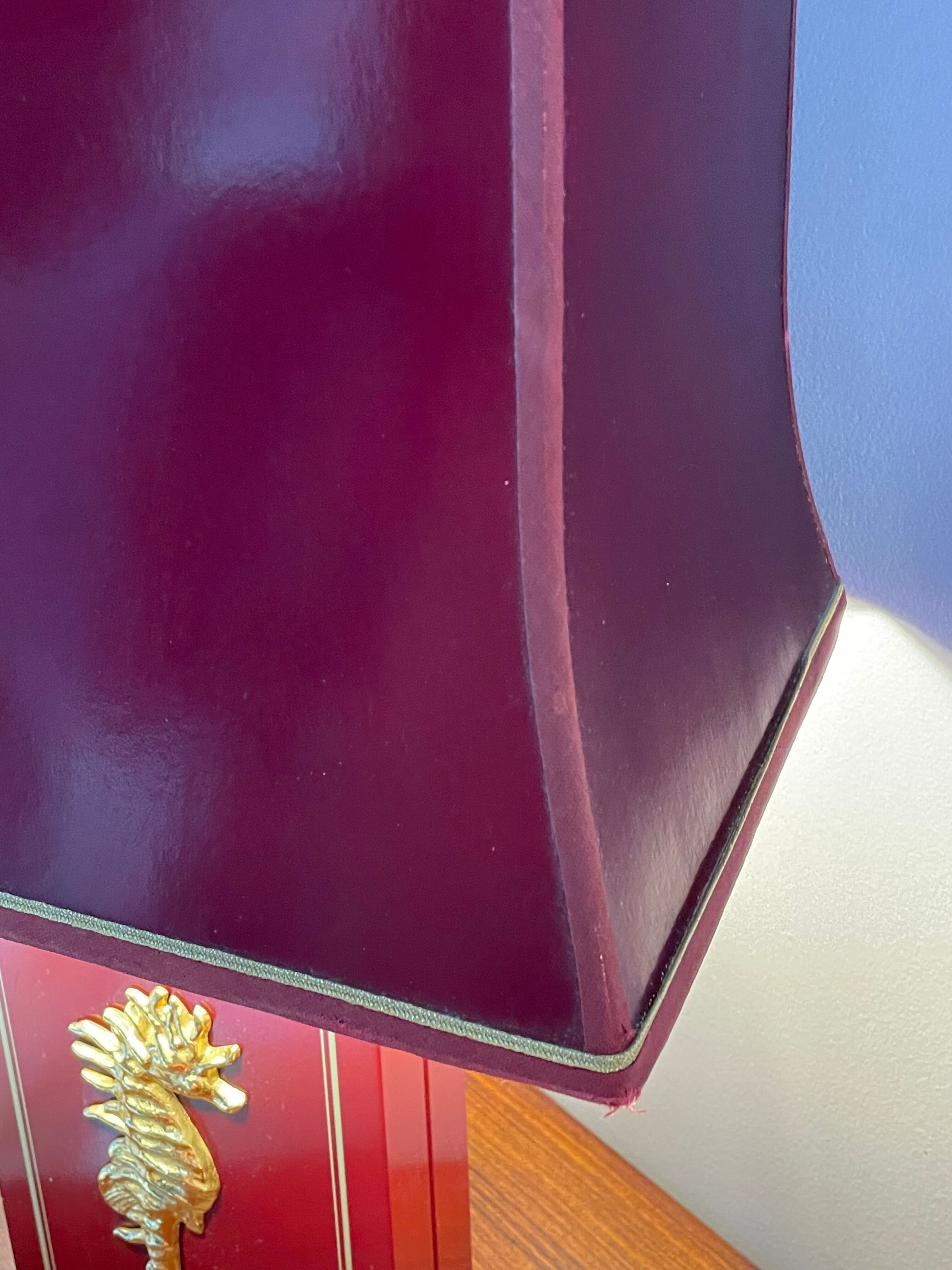 Pair of table lamps in Bordeaux lacquered wood and brass seahorse