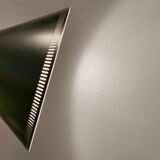 Cone pendant produced by Danish Lyfa in beautiful black lacquer with perforated shade and brass top.