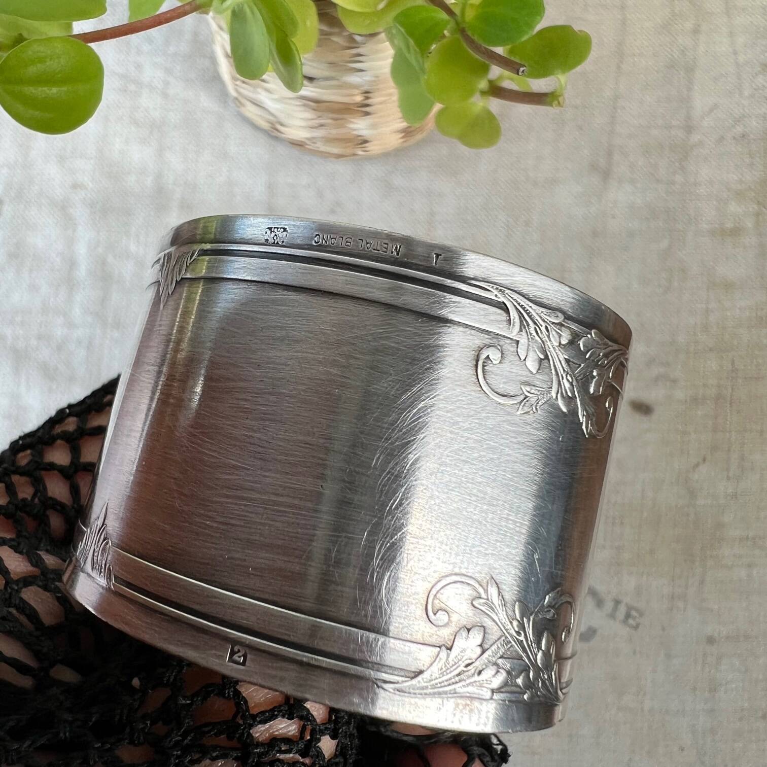 White metal napkin ring