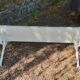 Old garden bench with cast iron feet and wooden planks