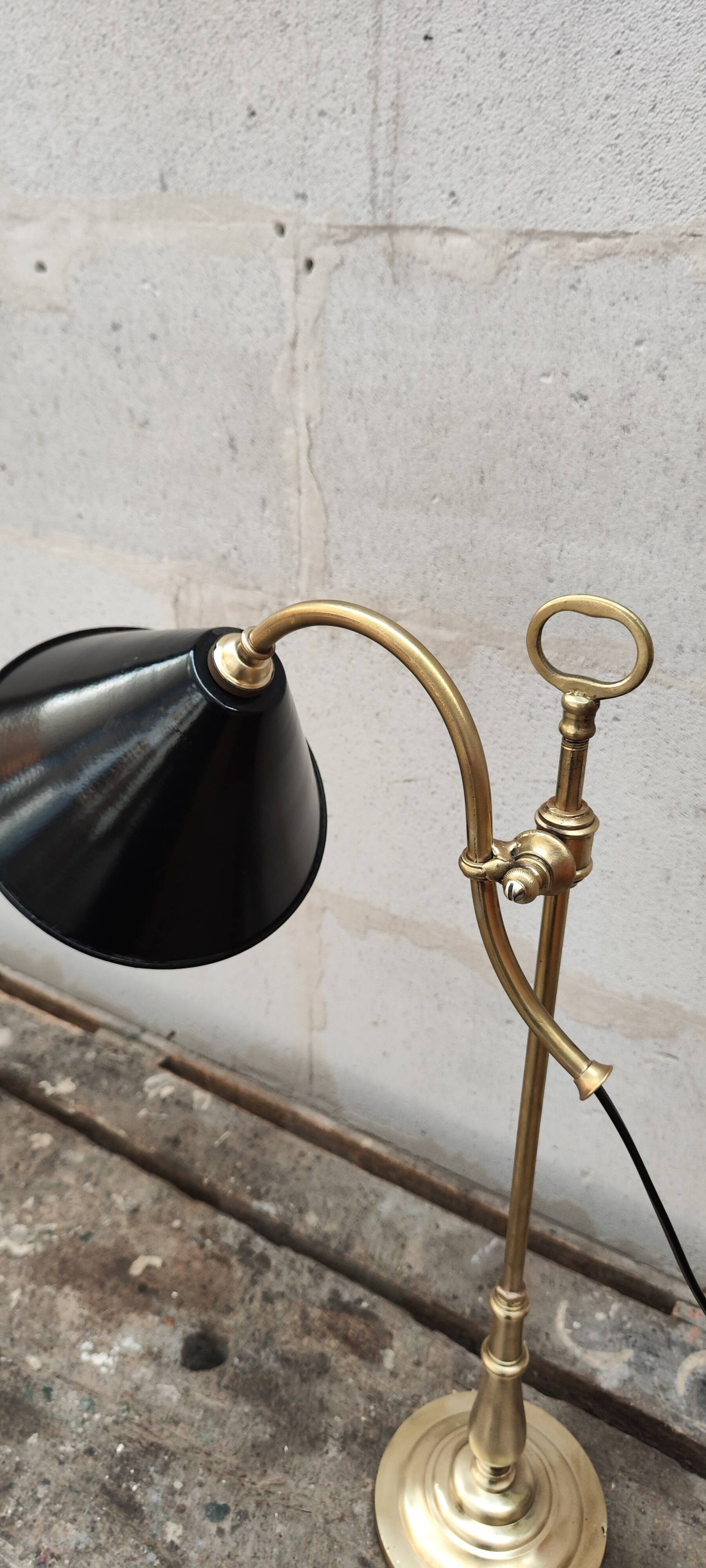 Old lamp in gilded bronze and brass with black enamel lampshade