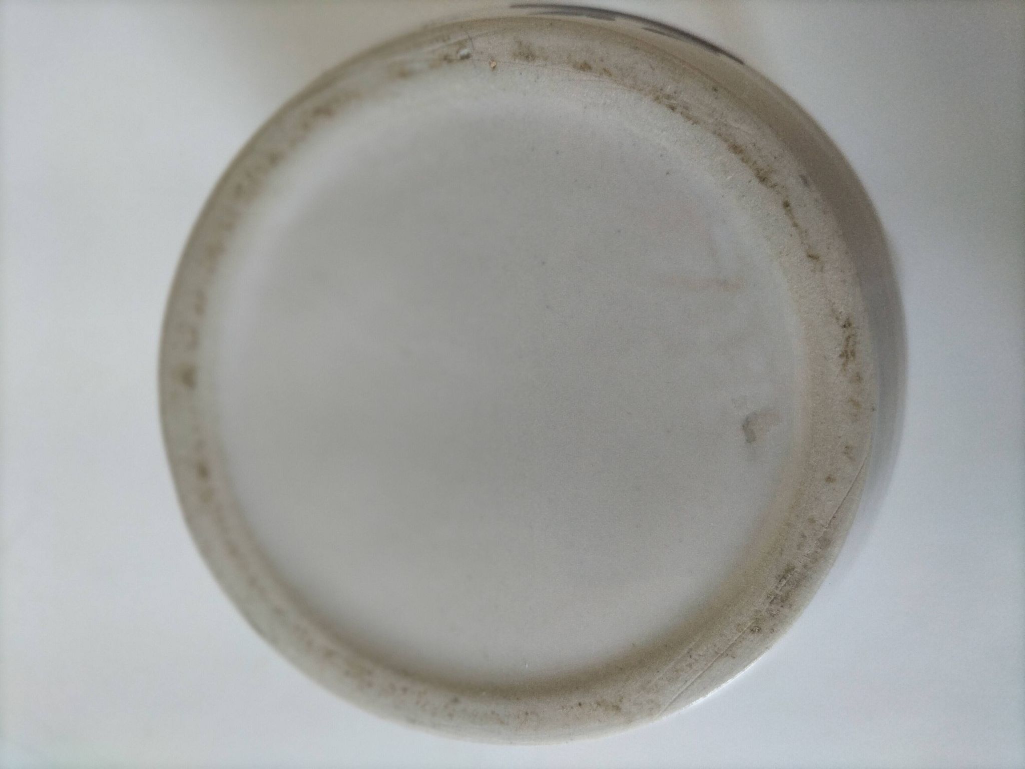 Ceramic pitcher from Quimper, created by Dominique Villard.