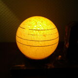 Table lamp with pendulum