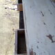 Large wooden desk with patinated bleacher