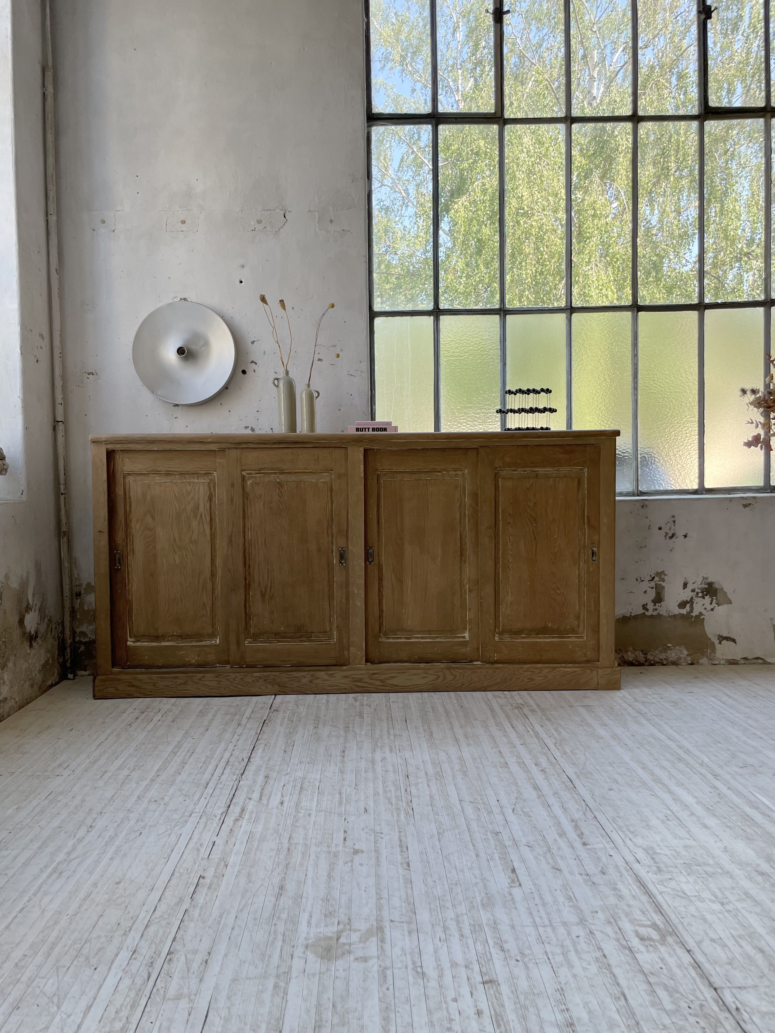Large row of solid oak loom sliding doors