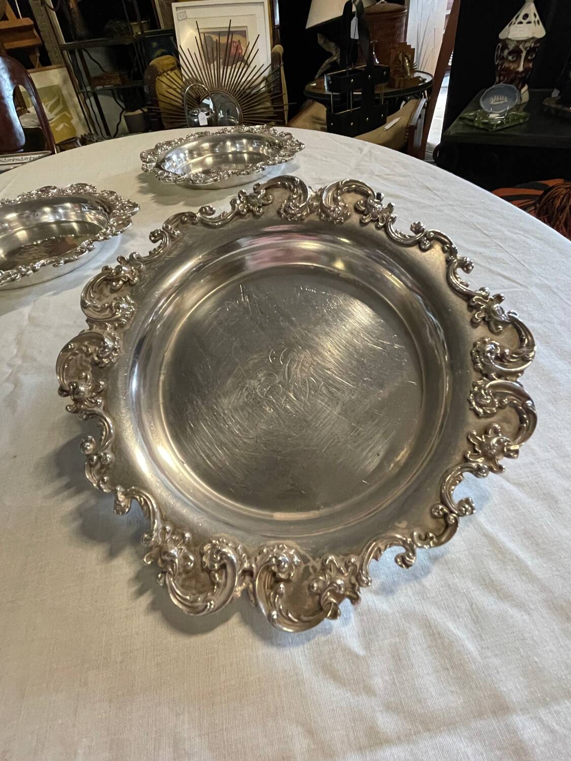 Set of 4 silver metal bottle coasters