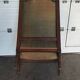 Large Louis XVI style bergère armchair in amber brown velvet