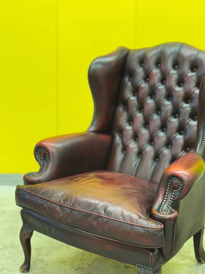 Burgundy leather chesterfield wing chair with Ottoman