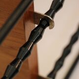String shelf in wood and black metal