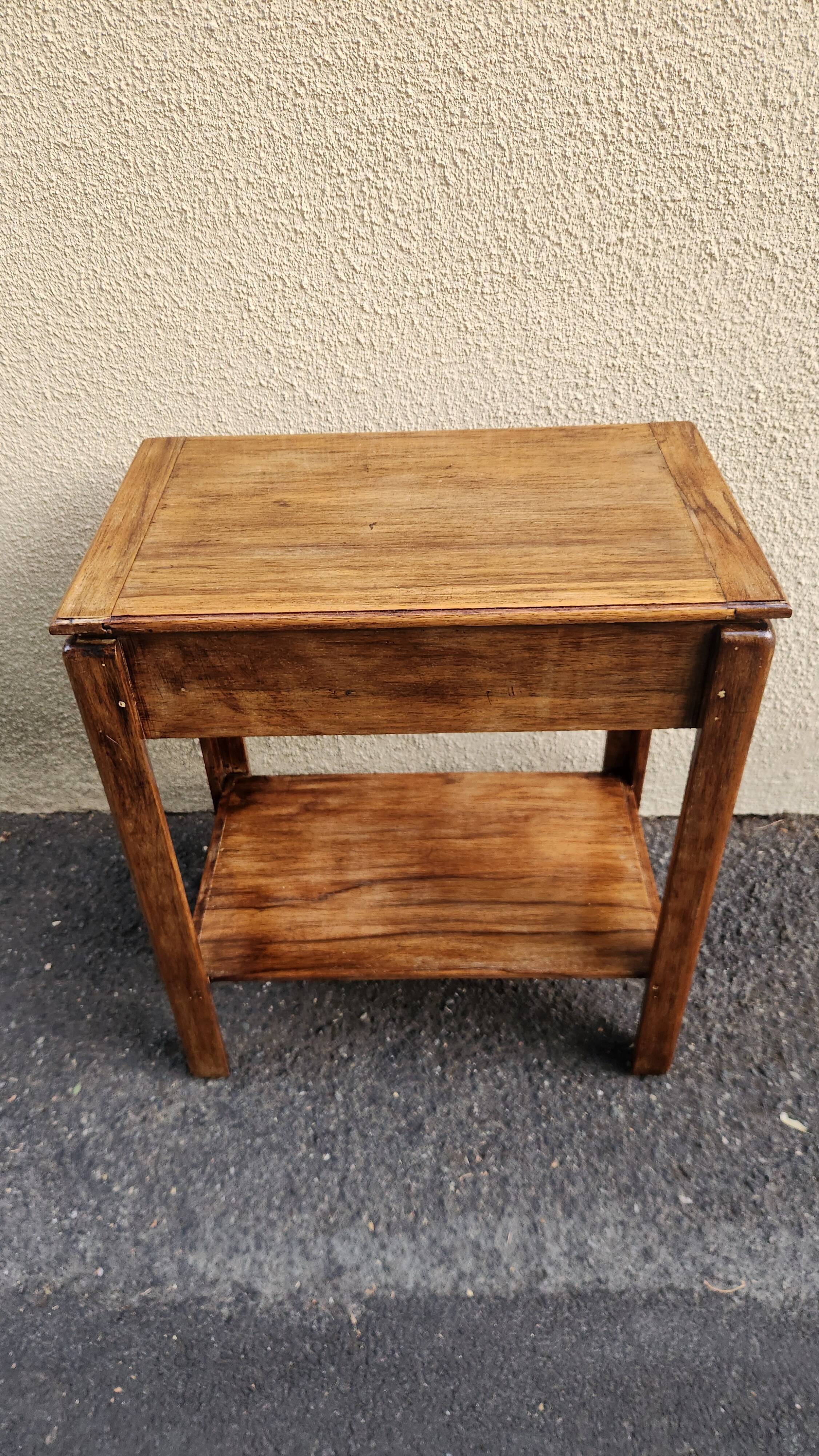 Beautiful vintage wooden bedside table with mirror.