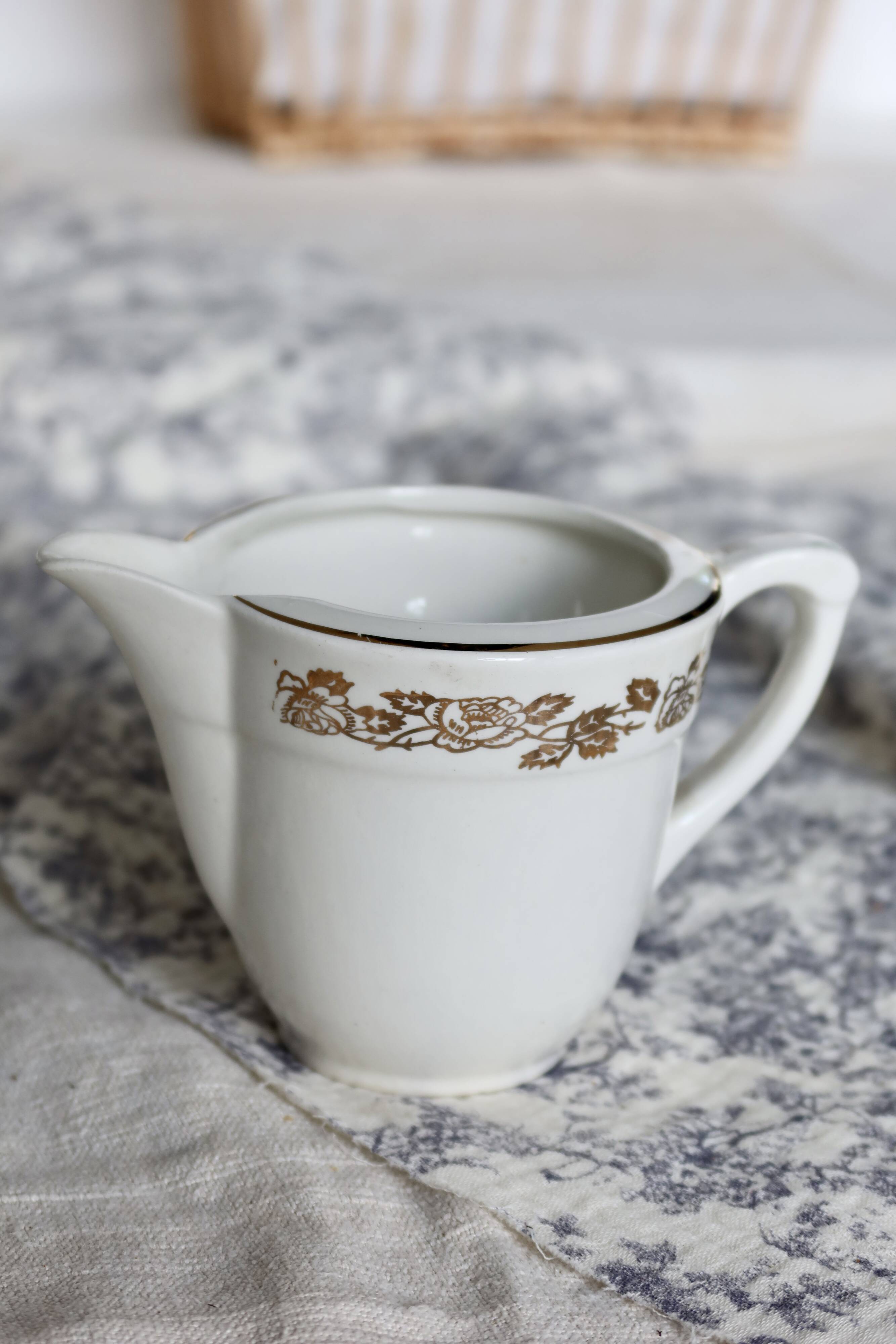 Vintage earthenware milk jug from Moulin des Loups – Gold floral motif