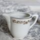 Vintage earthenware milk jug from Moulin des Loups – Gold floral motif