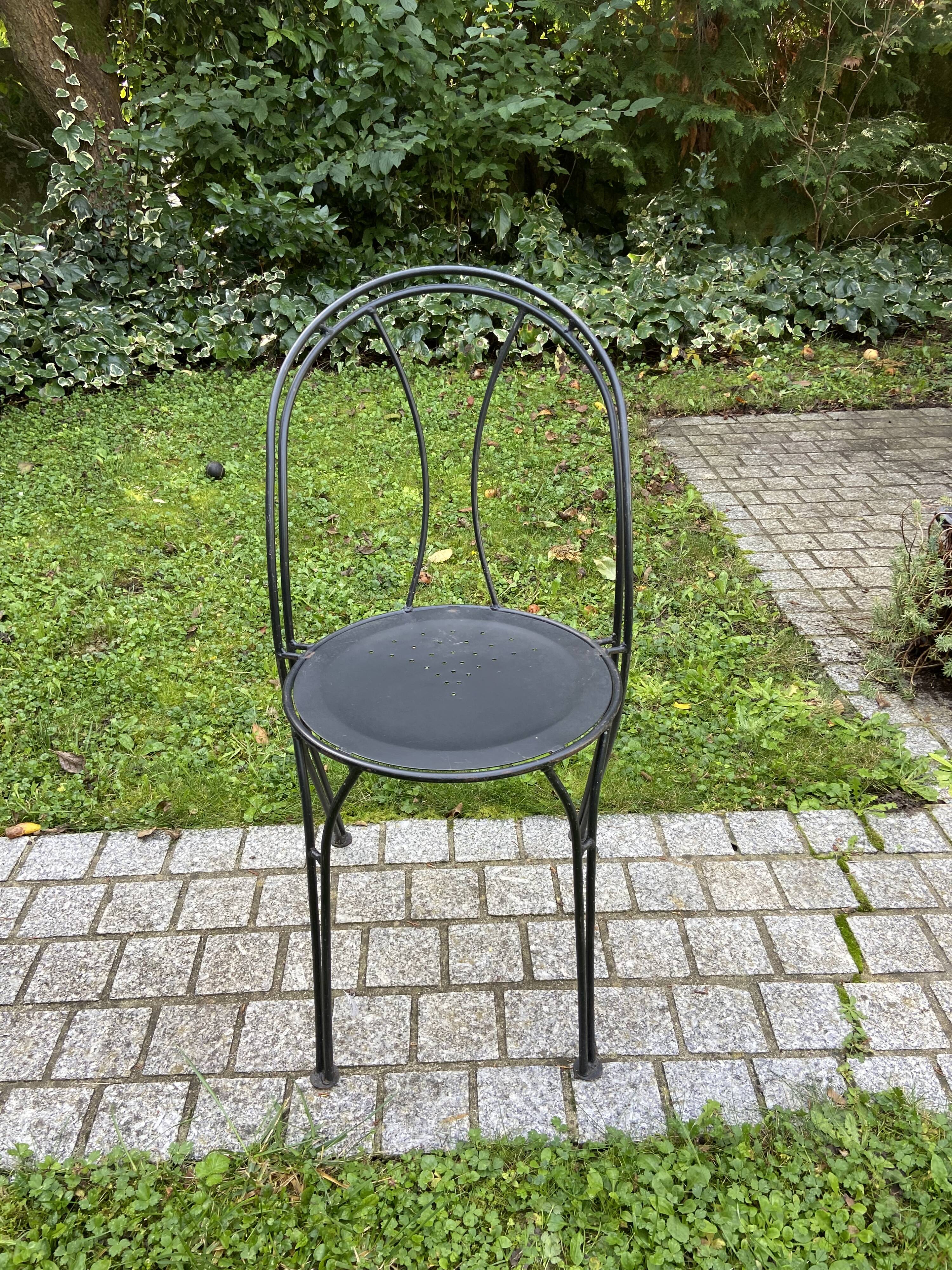 Black chair in vintage wrought iron 1980