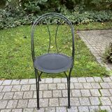 Black chair in vintage wrought iron 1980