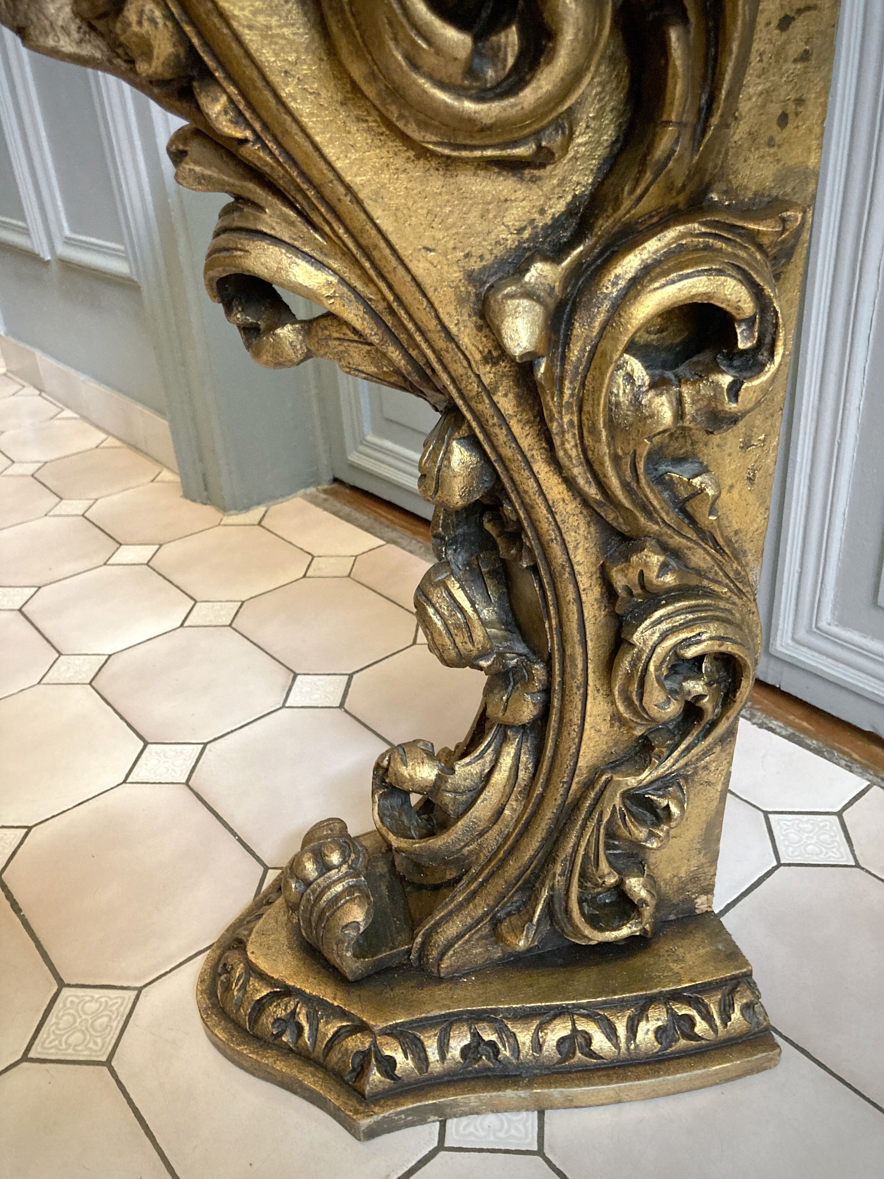 Carved wooden and marble console