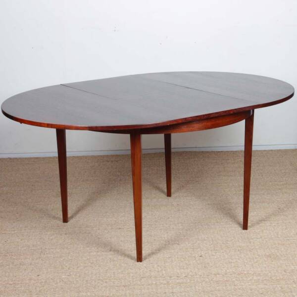 Round extendable dining table in Rio rosewood, 1960