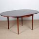 Round extendable dining table in Rio rosewood, 1960