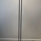 Floor lamp in black lacquered metal and brass