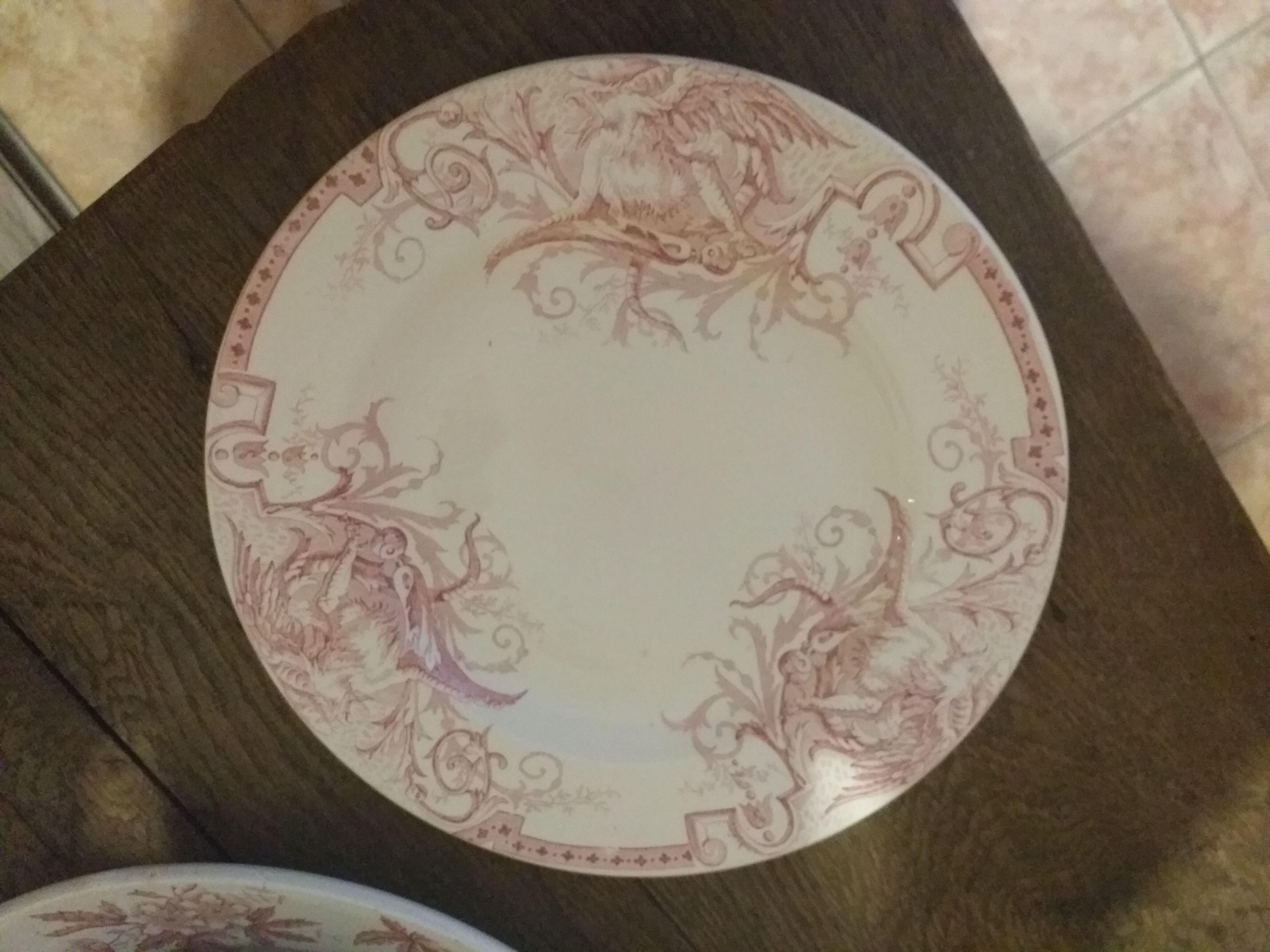 Porcelain plate of Lunéville model Griffon