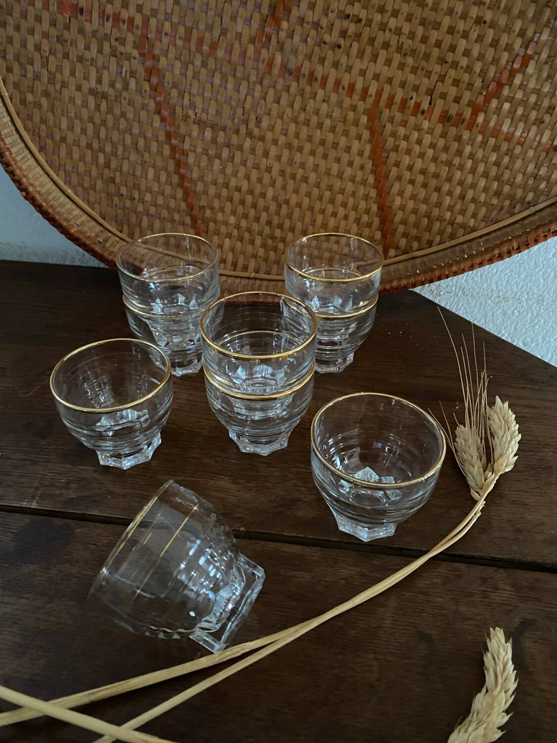 9 vintage gold rimmed glasses.